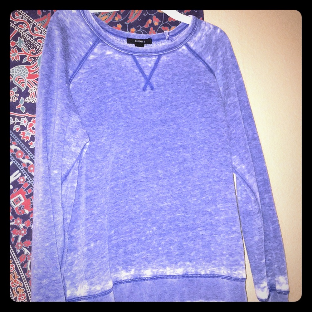 Faded blue sweater